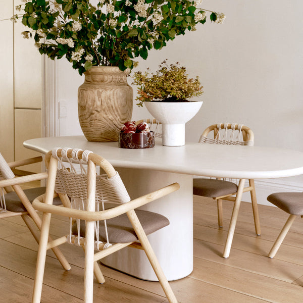 How Designers Choose Dining Chairs to Complement—not match—a Dining Table